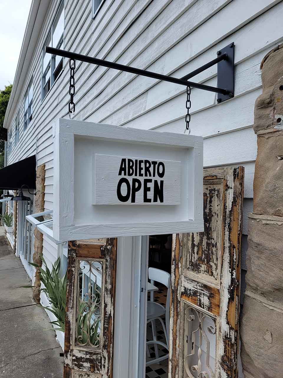 Abierto Open hanging sign